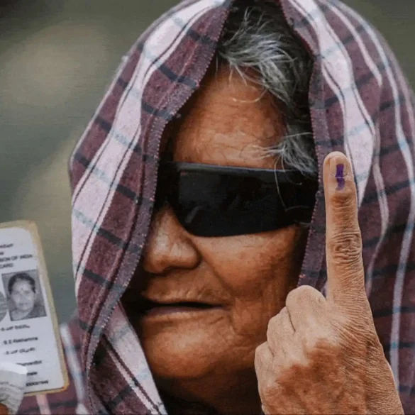 Women voters wait to cast their votes for the phase 2 of Lok Sabha elections